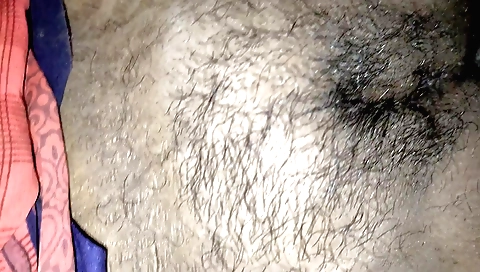 Indian wife shows us her hairy pussy and shoves a condom