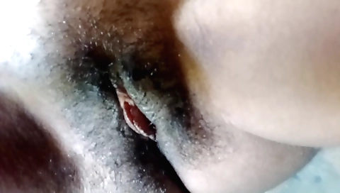 Indian hairy girl masturbates and fucks in amateur video