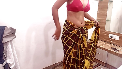 Indian girl in sexy dress and shorts in a solo video