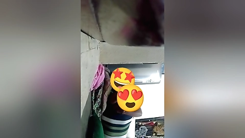 Indian webcam video with a brunette in a red dress