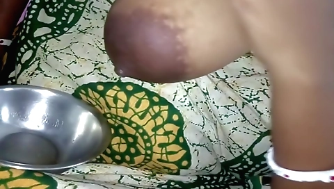 Lassie with big boobs is masturbating and licking a fan