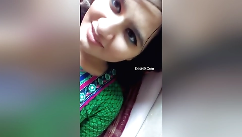 Brunette with small tits in red dress is on webcam 2013