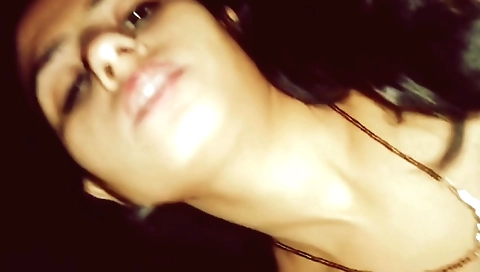 Latika is riding a dick while her ass is stretched to the max