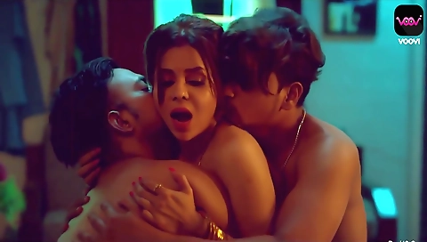 Amature brunette with big tits is having a threesome