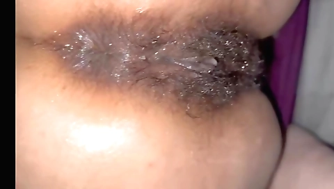 Indian girl in a black bikini makes herself wet and beautiful