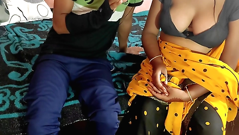 Indian brunette stepmother shows her tits in the bedroom