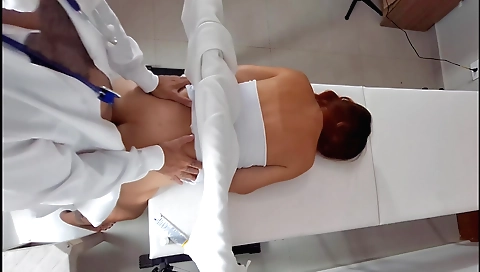 Red head with a beautiful body shows her natural tits in this video