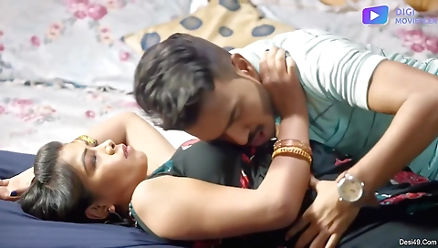 Black dress and a black hoodie on a brunette on a black hoodie