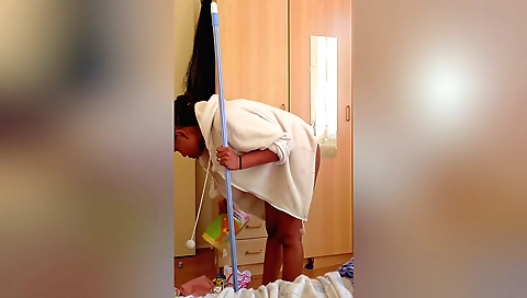 Solo female masturbates in her private room in a satin dress