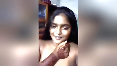 Busty brunette shows off her booty on camera in solo video