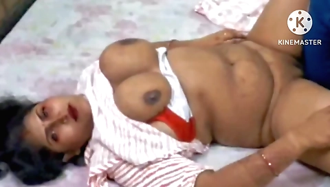 Brunette chick with big booty and huge boobs in the kitchen