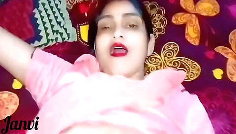 Amateur brunette girl and her boyfriend play in the living room