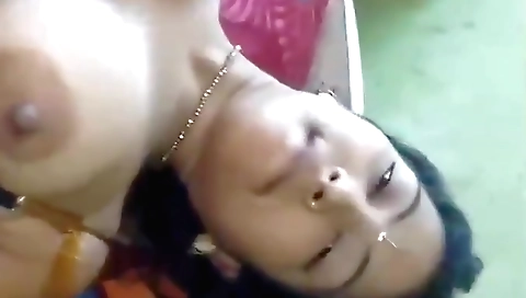 Indian slut with huge boobs is playing with her vibrator