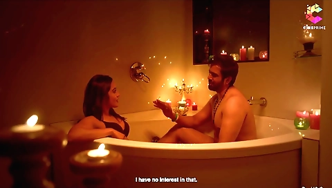 Brunette in black top and black shorts makes a call