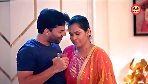 Big boobed brunette with a nice body showing off her body