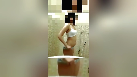 Indian girl shows off her body in her shower solo video