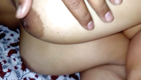 Indian stepsister with big boobs is showing off in bed