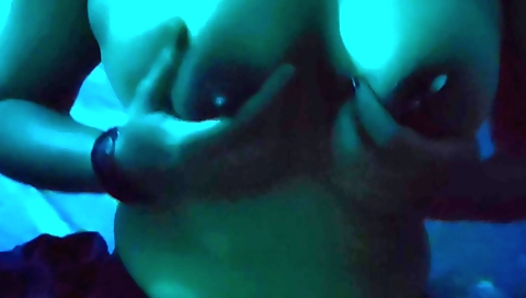 Sexy indian girl is posing with her clothes on the sofa