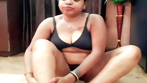 Indian housewife with big tits shows her naked body