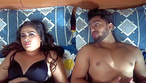 Brunette girl with short hair is showing off her body