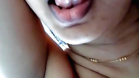 Indian wife shows her small tits in the amateur video