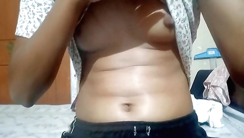 Indian babe with a nice body and a cute face shows off