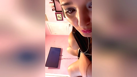 Brunette girl in the camera is masturbating on her own