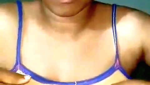 Busty girl with large boobs stretches her body wide