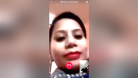 Black blouse and skirt with a sexy brunette in webcam