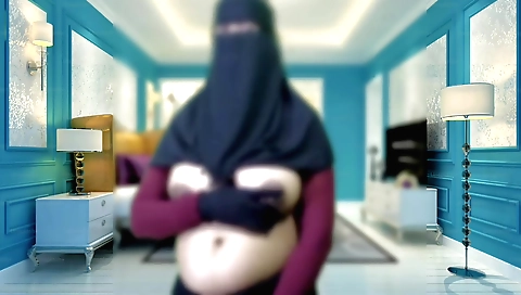 Indian housewife in a sexy leather pant and sexy earrings