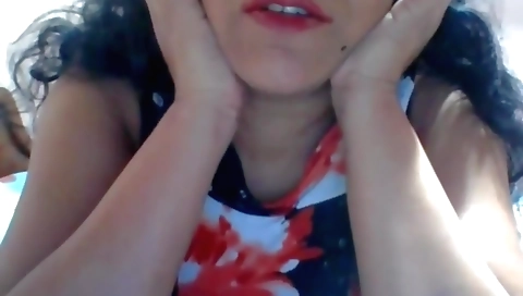 Busty brunette woman looking her pussy naked on webcam