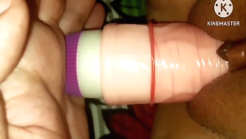 Indian woman with big ass is playing with plastic toys